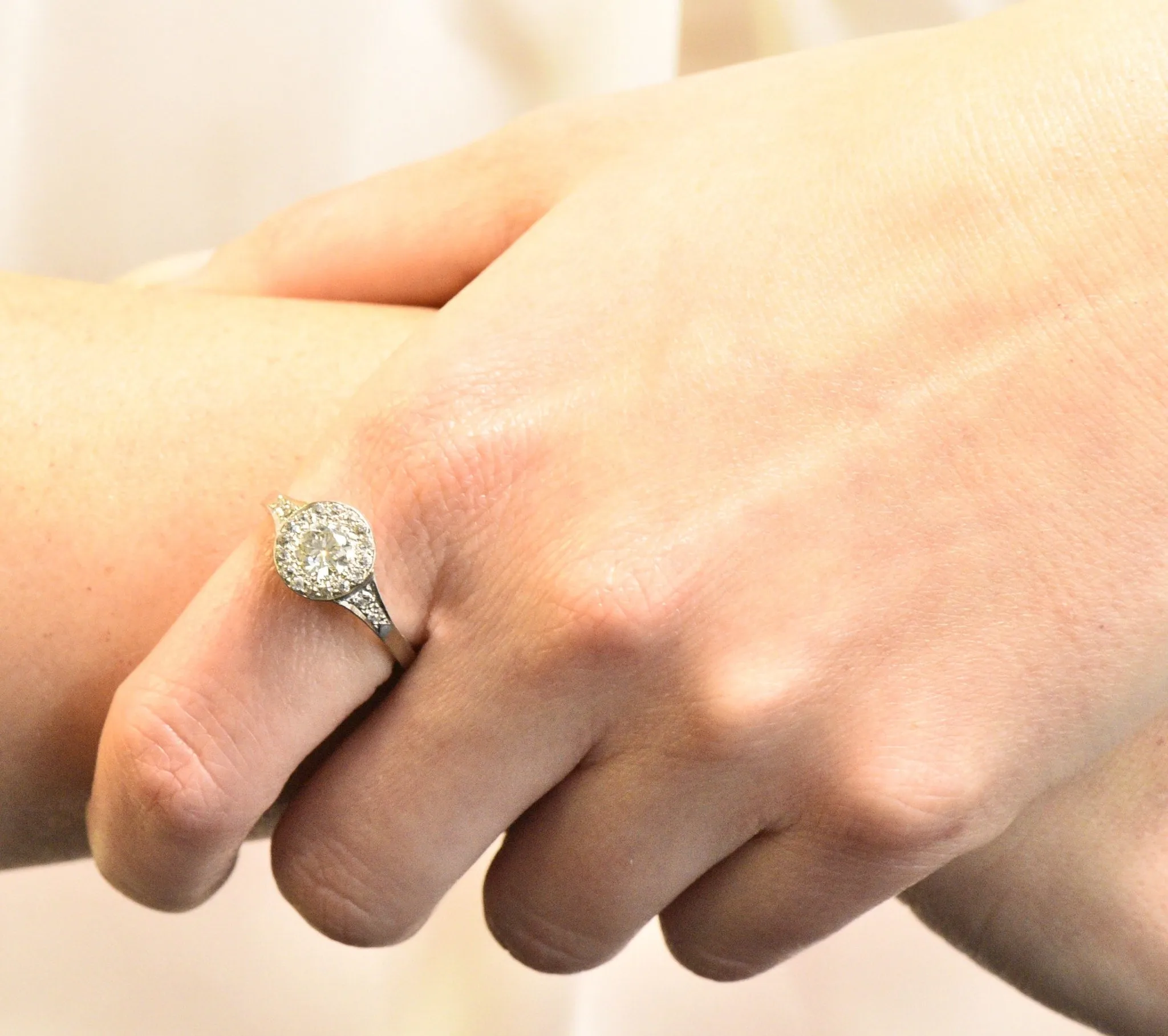 Art Deco 1.10 CTW Diamond Platinum Halo Engagement Ring Circa 1930